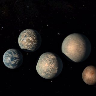 Visiting the Earth-Like Worlds of TRAPPIST-1