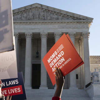 Gun Split Screen: Biden Signs Safety Measures As Justices Nix A Century-Old Law